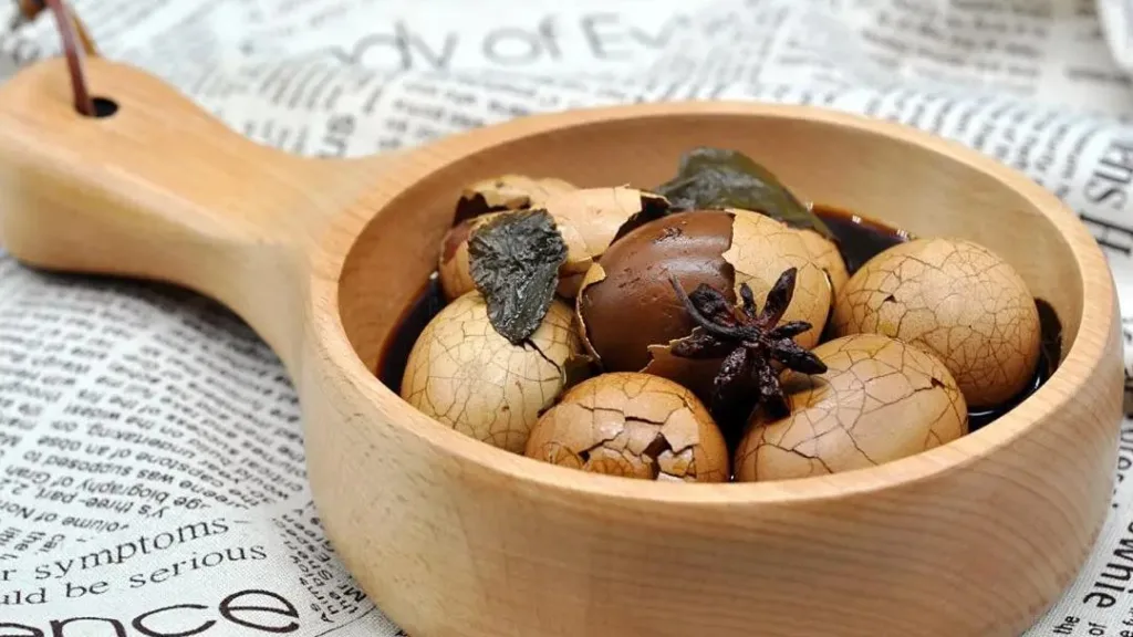 Why do people eat tea eggs during Chinese new year?